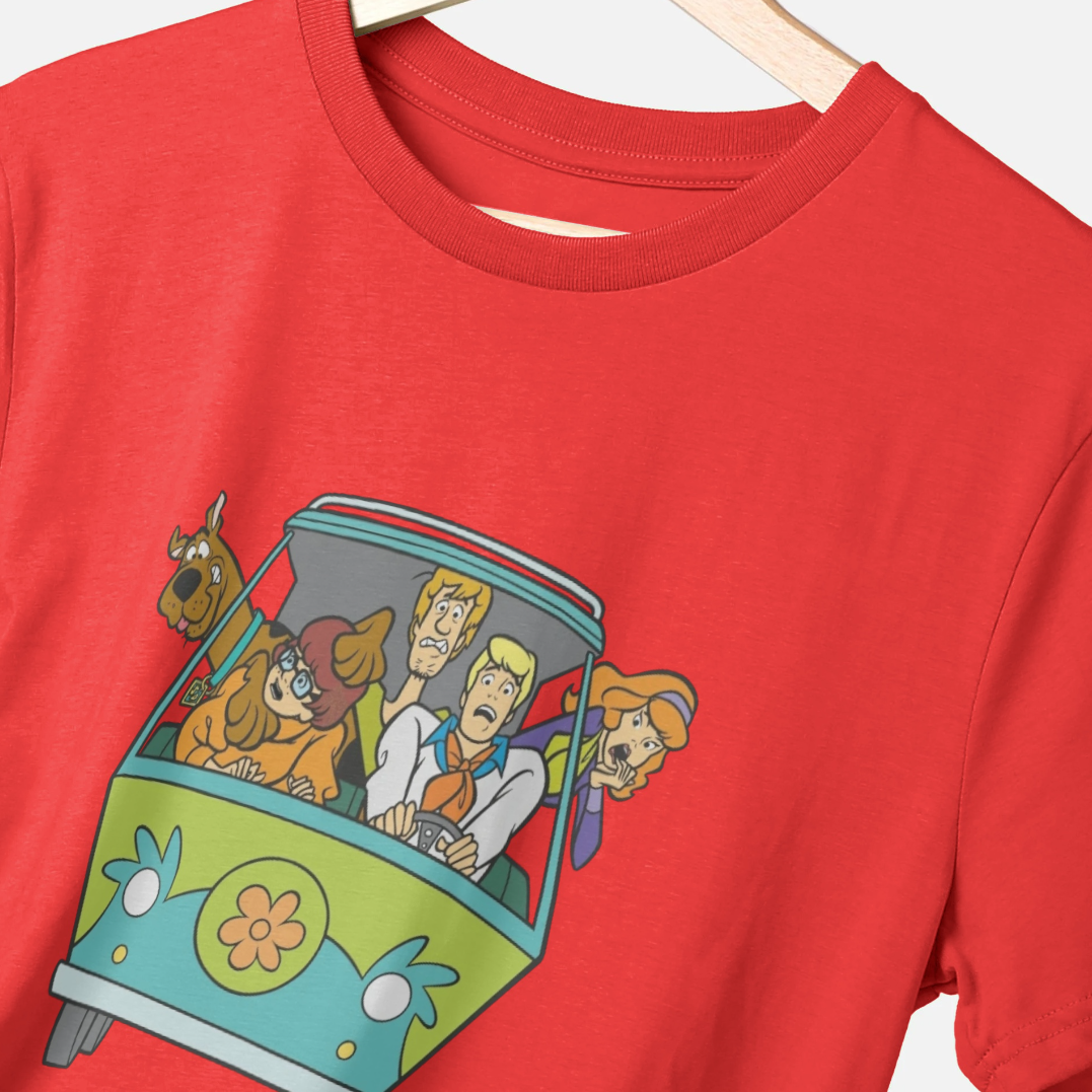 Red t-shirt with a cartoon graphic of the mystery machine van and four people on a white background