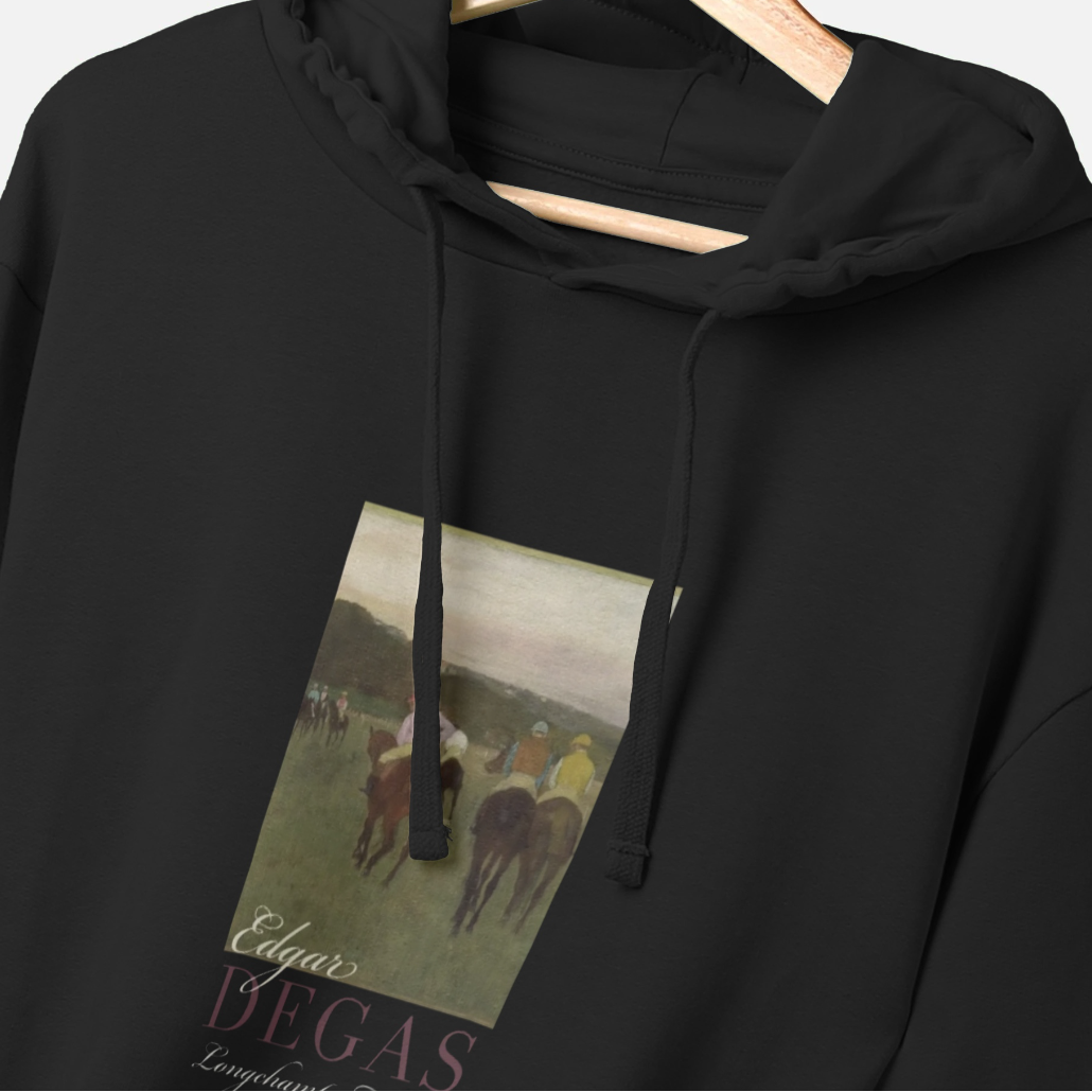 Black hoodie with artistic print on a hanger